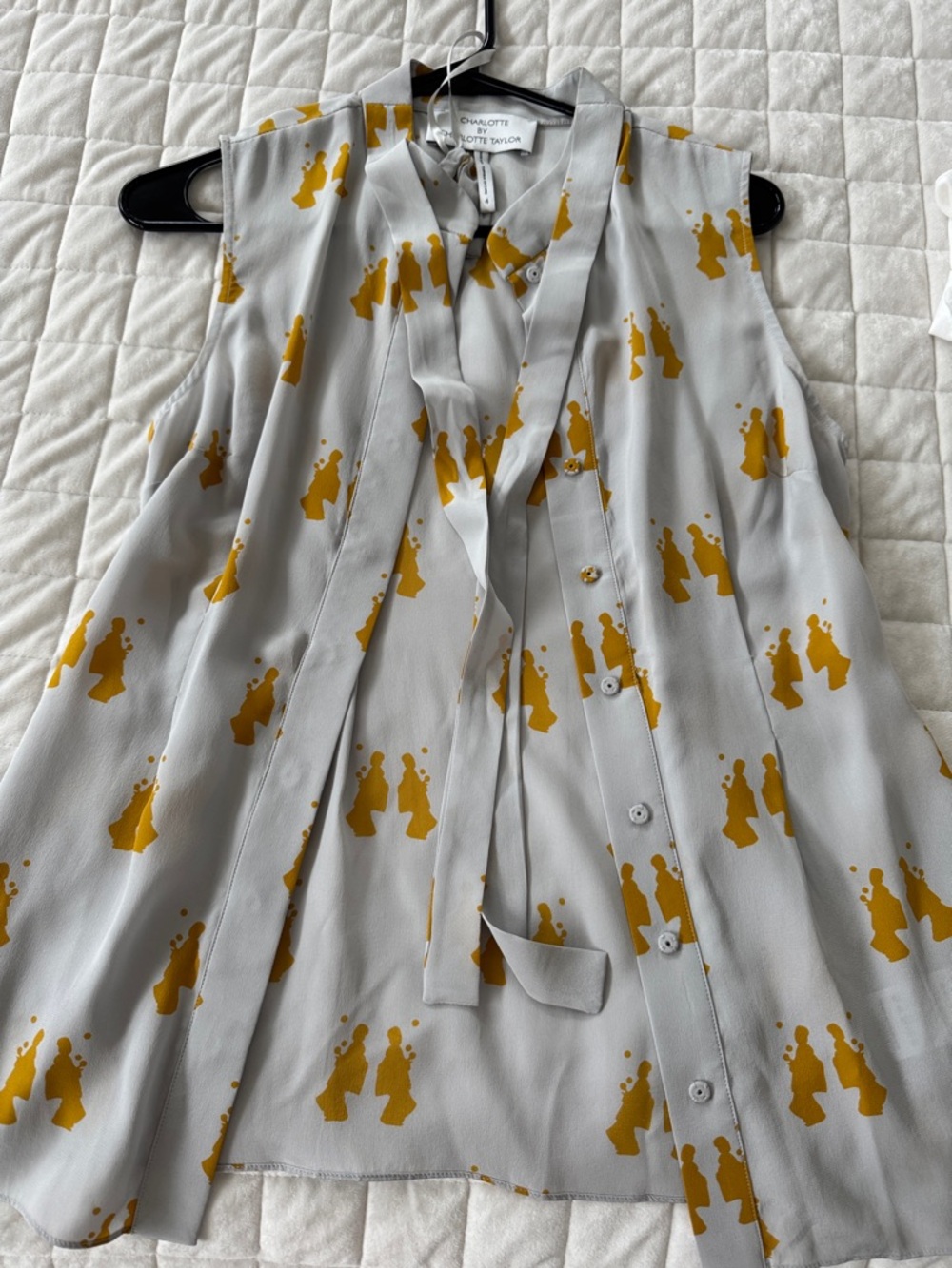 Sleeveless Tie-Neck Blouse in Light Gray with Mustard Print